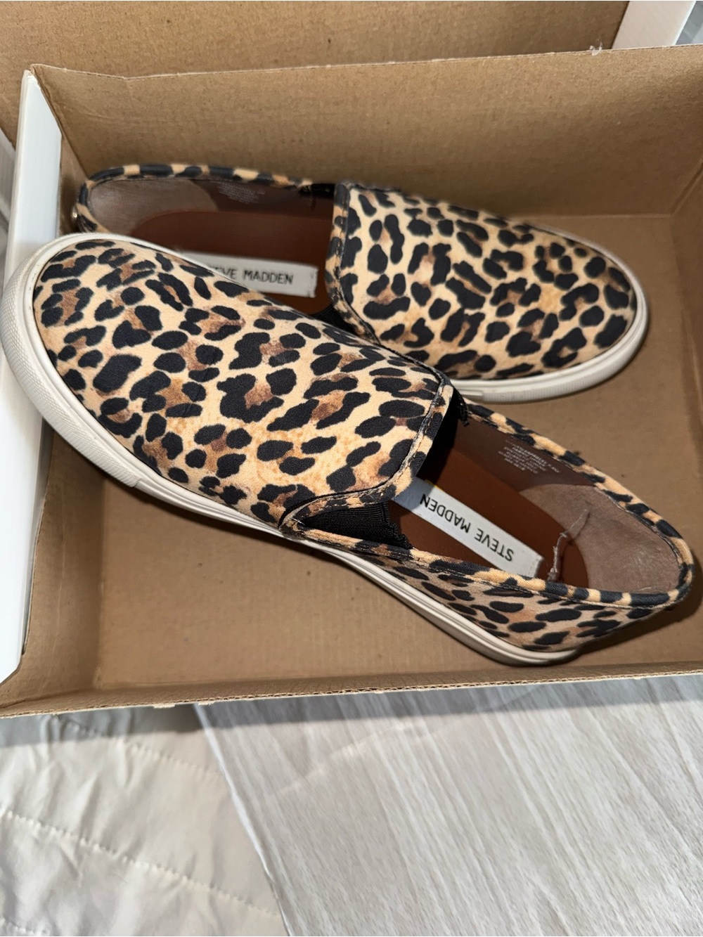 Steve Madden Leopard Print Slip-On Sneakers in Black and Tan